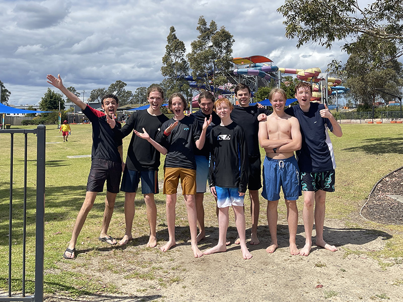School group in front of slide