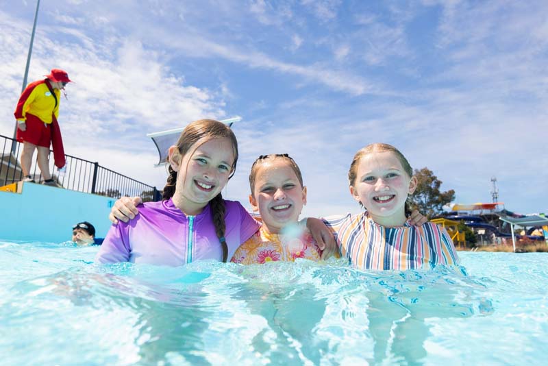 young girls in the beach wave pool
